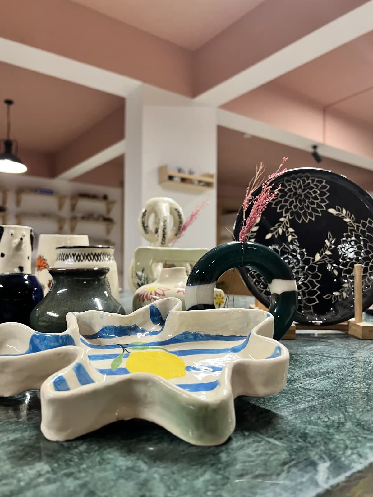 Glazed handmade tableware and ceramic forms from Mann Mozhi workshops